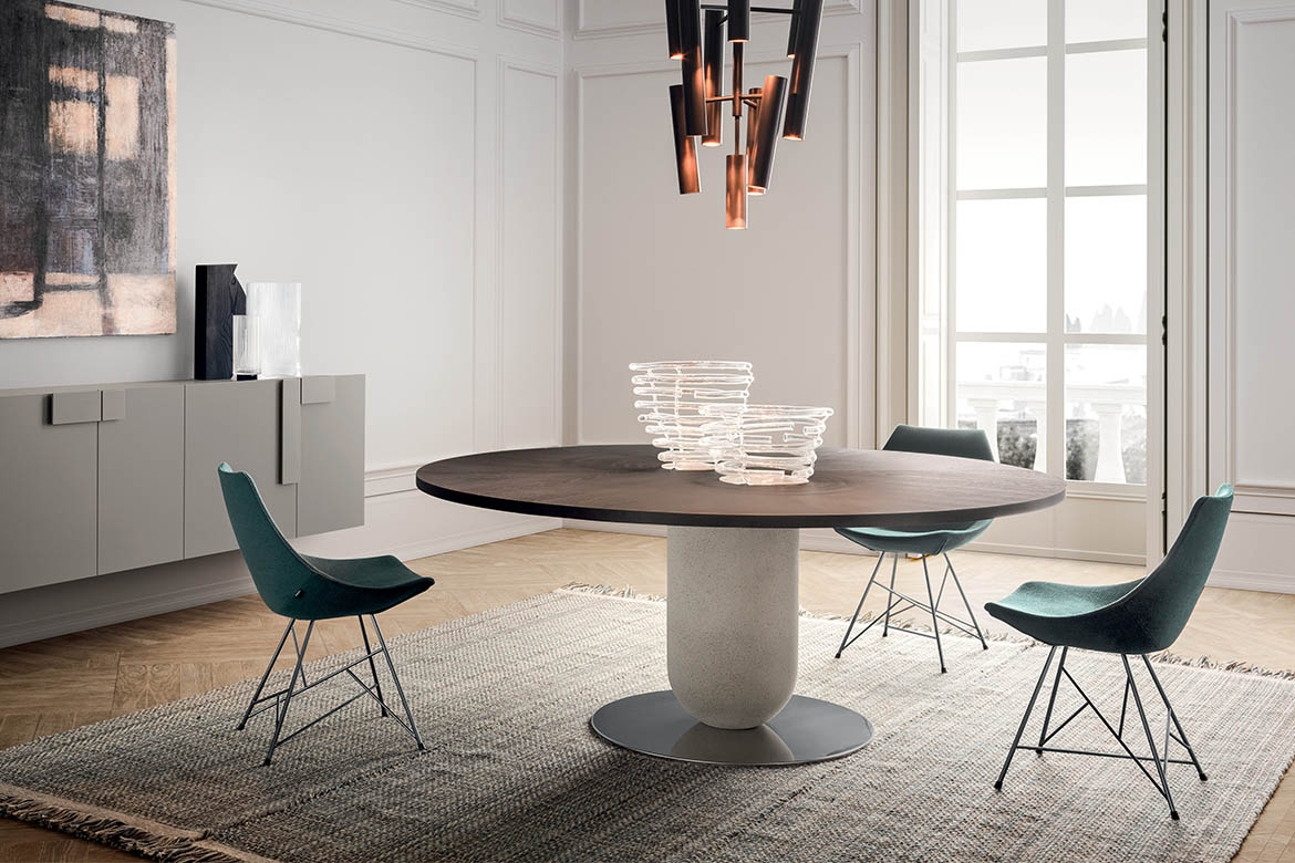 Pianca Ettore dining table with teal dining chairs